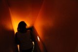<p>Dorothy Tate walking down to the basement of her Englewood home.</p>
