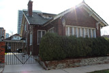 <p>In case you were wondering, disgraced former U.S. Rep. Jesse Jackson Jr. (D-Chicago) &mdash; who resigned from office on Nov. 21 citing the federal investigation of his &ldquo;activities&rdquo; and his ongoing battle with bi-polar disorder &mdash; lives in a house with peeling paint&nbsp; that sits behind iron bars on a dead end street in South Shore.</p>
