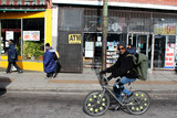 <p>This cyclist pedaling through South Shore near 71<sup>st</sup>&nbsp;and Jeffery &mdash; past a Fruit of Islam vendor hawking Final Call newspapers and scented oils &mdash; proves what North Side <a href=