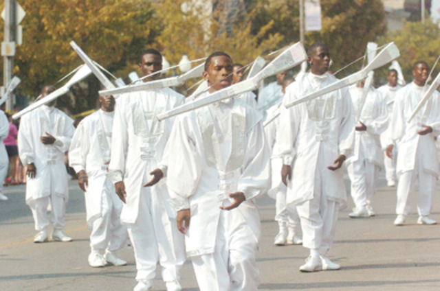 <p>Performing in their signature all-white, the South Shore Drill Team gets down to the business of entertaining.</p>
