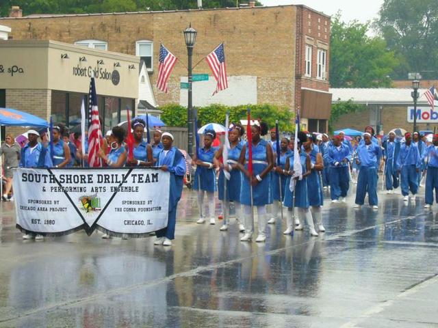 <p>Rainy weather did not stop the South Shore Drill Team from performing at this event in Gary, Ind. this summer.</p>
