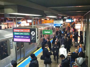  Passengers wait for CTA trains. 
