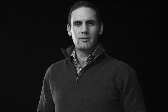 <p>Jay Michael, an executive with Cedar Street Companies, hopes to turn seven buildings on Chicago's North Side into hip apartments.</p>
