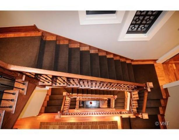 <p>A stunning spiral staircase carves through the four story home.</p>
