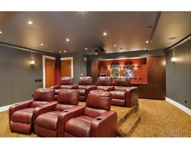 <p>If a movie runs too long at one of the house's entertainment hubs, you can relocate to the seven-seat theater downstairs.</p>
