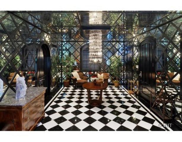 <p>A glass-enclosed atrium, complete with a waterfall, brings nature inside.</p>

