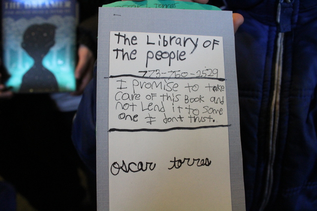 <p>Each person using The People&rsquo;s Library has to fill out a library card and make a promise, whether it&rsquo;s to bring the books back or be nice to Perveiler.</p>
