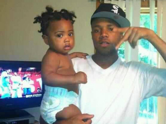 <p>Darvelle Brown, 24, was killed by gunfire in West Garfield Park Jan. 8. Here, Brown is pictured with his nephew.</p>
