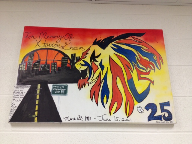 <p>A painting memorializes former CICS-Ellison student Estavion Green, who was fatally shot in 2011. Note: Estavion's name is spelled wrong in the painting.</p>
