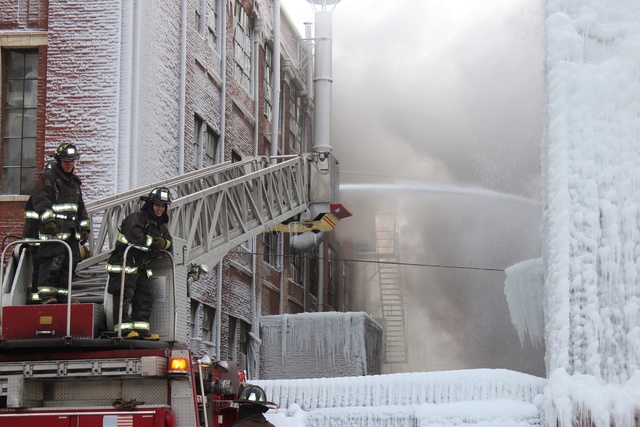 <p>Large clouds of smoke could be seen from about half a mile away as trucks blasted water on Thursday.</p>
