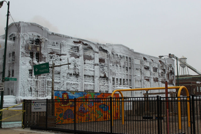 <p>A frozen warehouse on South Ashland Avenue the day after a massive fire raged in the building on Tuesday night.</p>
