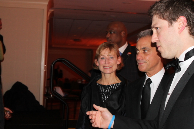 <p>Mayor Rahm Emanuel and his wife, Amy Rule, mingle at the Illinois Inaugural Ball in Washington, D.C., on Saturday.</p>
