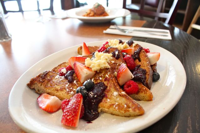 <p>French toast with homemade jam and berries at Isabel's Restaurant in Lincoln Park.</p>
