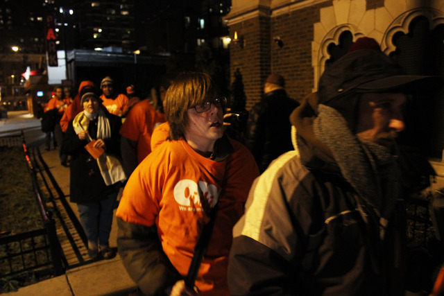 <p>Members of Organization of the Northeast, a social justice group in Uptown, marched outside developer Jay Michael's home in the Gold Coast.</p>
