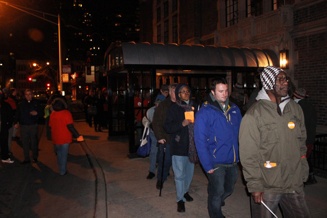 <p>Members of Organization of the Northeas march outside developer Jay Michael's home.</p>
