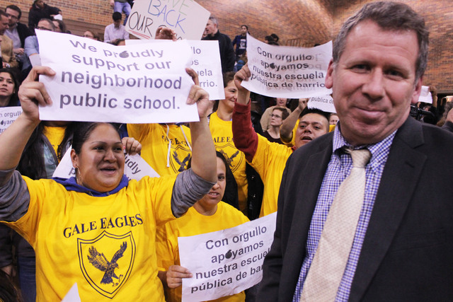 <p>Craig Benes, who oversees schools in the Ravenswood-Ridge region, tries to talk to a woman from Gale Elementary, but she did not listen &mdash; and he gave up.</p>
