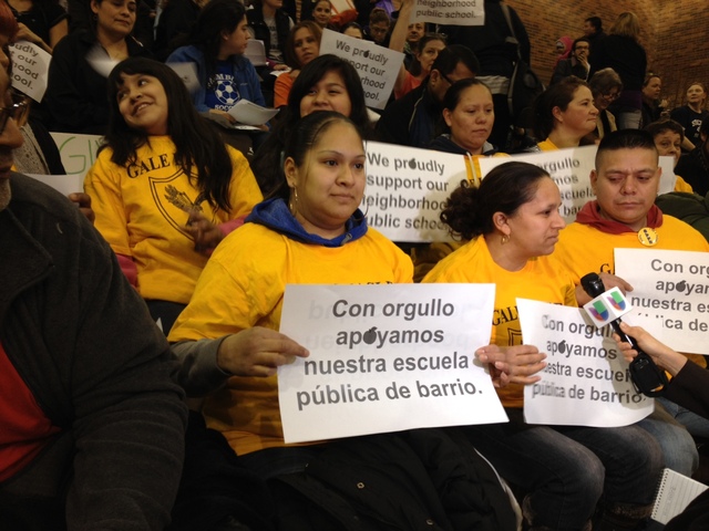 <p>Students from Gale Elementary hold signs supporting their neighborhood school.</p>

