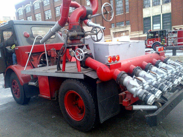 <p>The fire department brought out this decades-old deluge unit to blast water on the warehouse Thursday. The truck is rarely used, but still works to put out flames, the fire department said</p>
