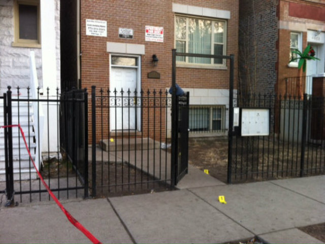 <p>Bullet markers on the scene where authorities say a Darvelle Brown was shot to death Tuesday morning.</p>
