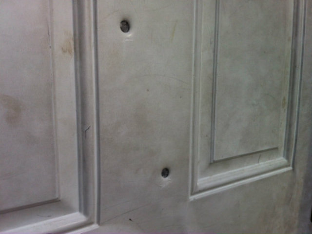 <p>Bullet holes were seen near where a man was fatally shot in the 4000 block of South Wilcox Avenue.</p>
