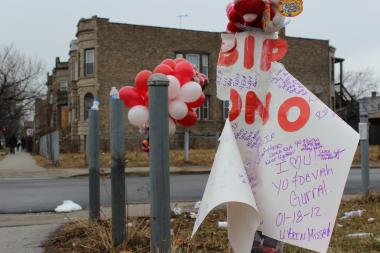 A makeshift memorial of teddy bears, balloons and poster cards decorate the corner of West Congress Parkway and South Kildare Avenue to remember Antonio Fenner and Dimitri Buford, who were shot and killed Saturday afternoon.