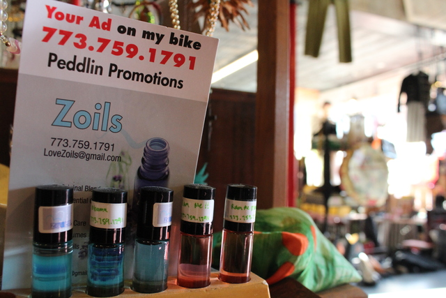<p>A collection of oils by perfumer Zorayda Ortiz is displayed at Pilsen Vintage and Thrift. Her oils also can be found at Wheel of Time bike shop and Round Two Resale.</p>

