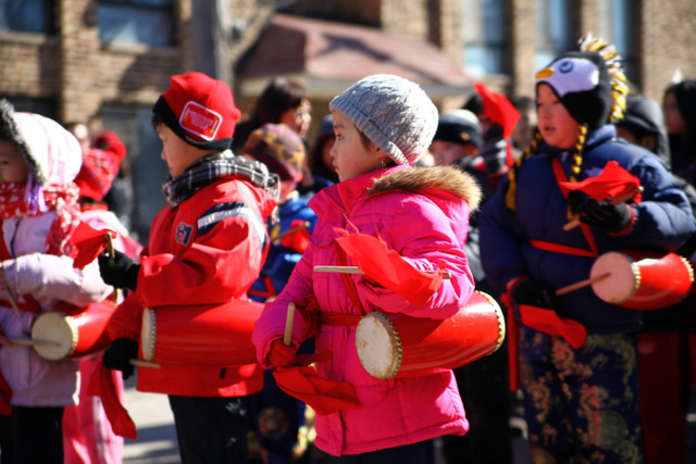 <p>Children play traditional drums in the 2013 Chinese New Year Parade in Chicago.</p>

