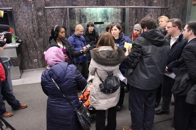 <p>Brentano Local School Council Member Kate Kindleberger talks to media in the lobby of CPS headquarters, Wednesday, Feb. 6, 2013.</p>
