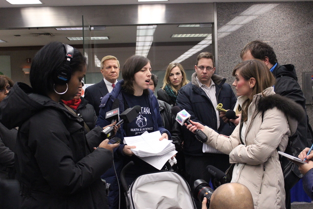 <p>Brentano Local School Council Member Kate Kindleberger talks to media in the lobby of CPS headquarters, Wednesday, Feb. 6, 2013.</p>
