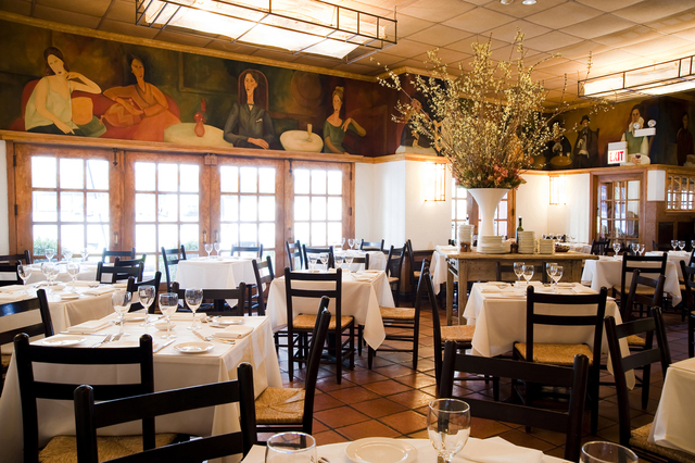 <p>The dining room at Coco Pazzo Cafe, 636 N. St. Clair St.</p>
