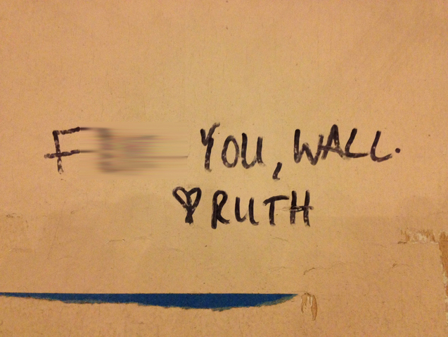 <p>A note written by Windy City Roller Kim Elsham after she hyper-extended her elbow by running into a wall at the organization's practice facility. Elsham said writing on the wall was "symbolic way of forgiving the wall for what happened."</p>
