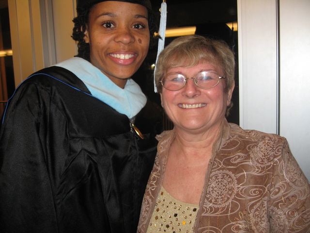 <p>Dominique Jacobs (left) poses with Margaret Klaus after earning her master's degree in education at North Park University.</p>
