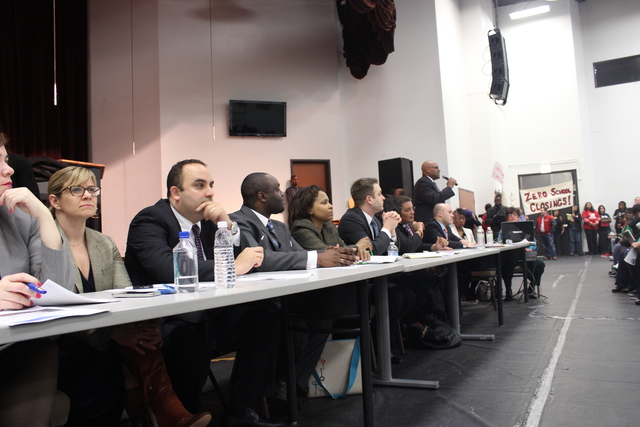 <p>CPS Director of Family and Community Engagement Philip Hampton speaks as other officials await testimony at the second CPS Garfield-Humboldt Network community engagement meeting, Wednesday, Feb. 27, 2013.</p>

