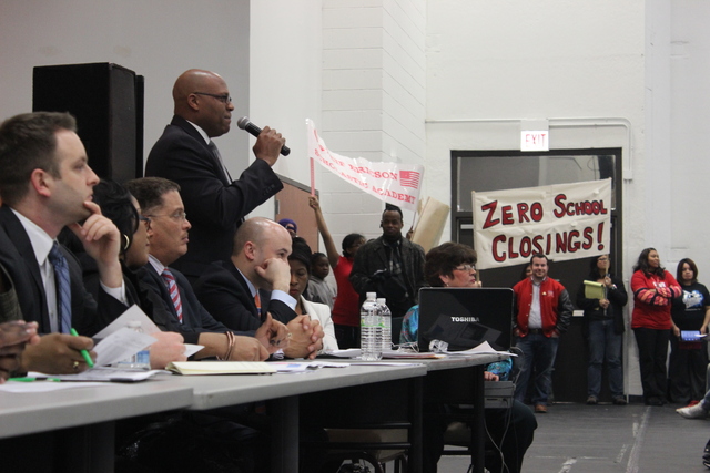 <p>CPS Director of Family and Community Engagement Philip Hampton speaks as other officials await testimony at the second CPS Garfield-Humboldt Network community engagement meeting, Wednesday, Feb. 27, 2013.</p>
