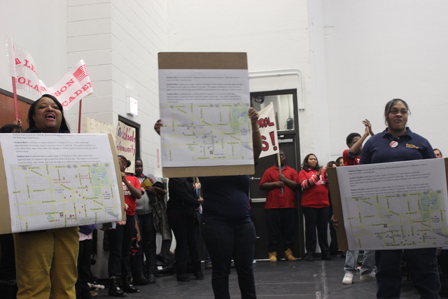 <p>Ryerson Elementary supporters hold signs to illustrate how far current Ryerson students would have to walk to get to other area schools at the second CPS Garfield-Humboldt Network community engagement meeting, Wednesday, Feb. 27, 2013.</p>
