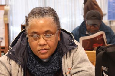  Doris White uses the computers at the Whitney M. Young Library branch in her job search. She said a library expansion in Lincoln Park "would have been finished" by now. 
