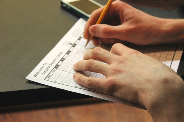 <p>Lincoln Square Lanes still features old school hand-scoring for bowlers.</p>
