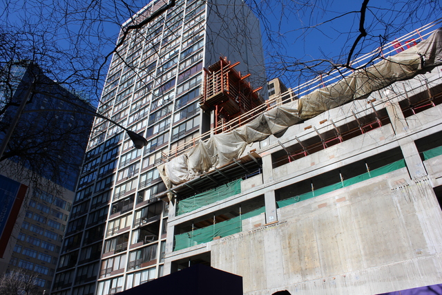 <p>White flame-retardant sheeting around the neighboring construction site kept the fire from spreading, worker John Paul Youpel hypothesized.</p>
