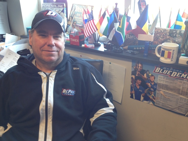 <p>DePaul women's tennis coach Mark Ardizzone poses in his office. Flags from the numerous European countries Ardizzone has visited on recruiting trips are in the background.</p>
