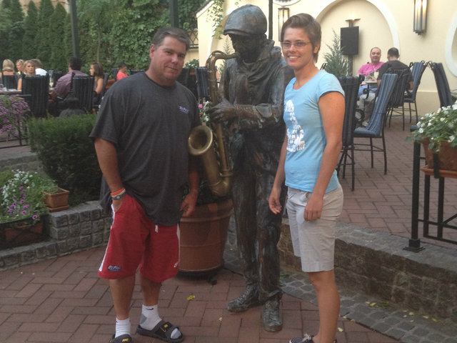 <p>DePaul women's tennis coach Mark Ardizzone poses with former player and graduate assistant coach Dunja Antunovic at a cafe in Subotica, Serbia, last summer.</p>
