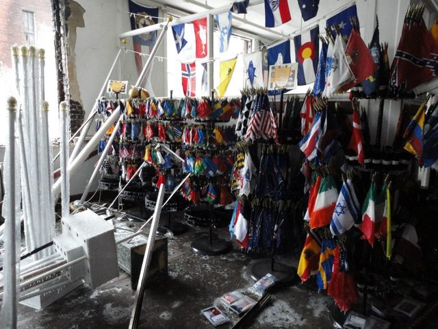 <p>Photographed on Jan. 23, this photo shows the Advertising Flag Co. showroom that was destroyed by smoke and ice after a Jan. 22 fire at a warehouse next door.</p>
