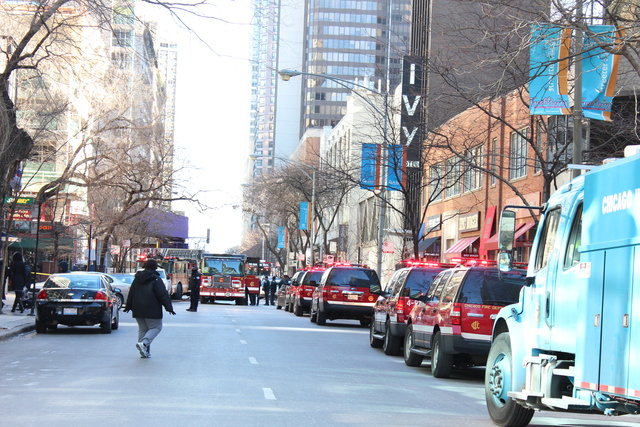 <p>Dozens of emergency vehicles packed East Ontario Street between St. Clair Street and North Fairbanks Court.</p>
