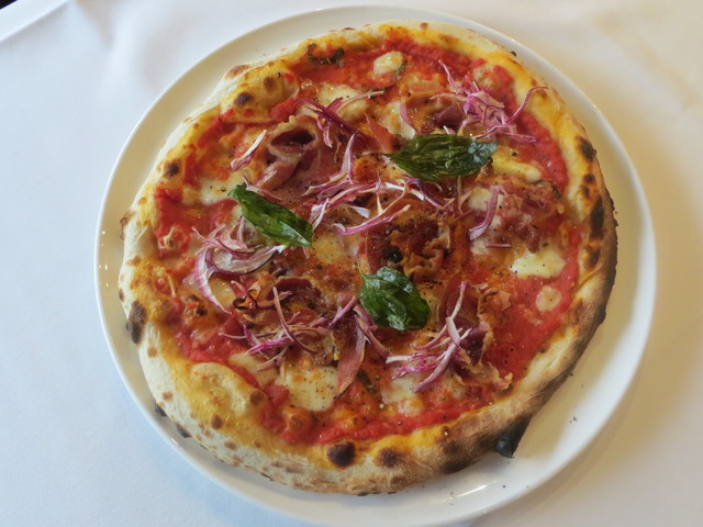 <p>Pizza Matriciano, with crispy pancetta, caramelized red onions, fried basil, mozzarella and Pecorino Romano, will be on the menu at Tre Soldi, 212 E. Ohio St.</p>
