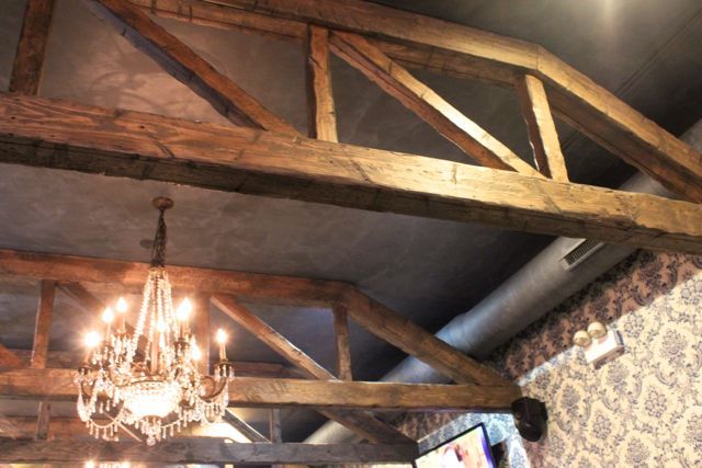 <p>Interior designer Karen Herold used reclaimed barnwood for the ceiling of High Noon Saloon at 1560 N. Milwaukee Ave.</p>
