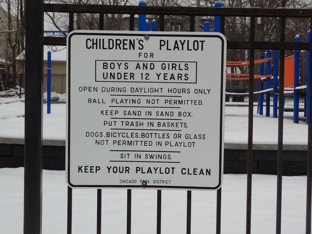 <p>A sign for the children's playlot at Vivian Gordon Harsh Park, where 15-year-old Hadiya Pendleton was fatally shot.</p>
