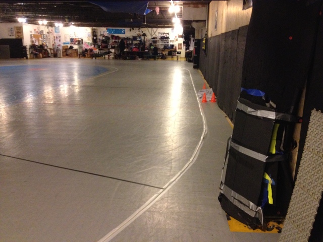<p>The Windy City Rollers organization practices in a secret location in Humboldt Park. Cement walls are precariously close to the track, and players routinely create holes by going into the wall.</p>
