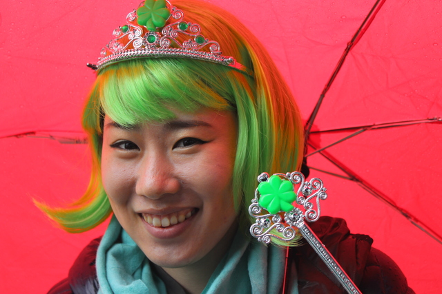 <p>Moonji Kim, a Korean foreign exchange student, said the rain didn't affect her first trip down to the South Side Irish Parade.</p>
