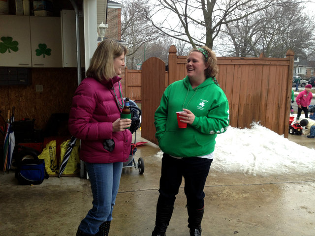 <p>Colleen Bahr, 38, (right), with friend Marybeth. Bahr, who hosted a party at her house on the first block of 104th Street, said calmer crowds meant she could "have an open party" rather than rope off her house.</p>
