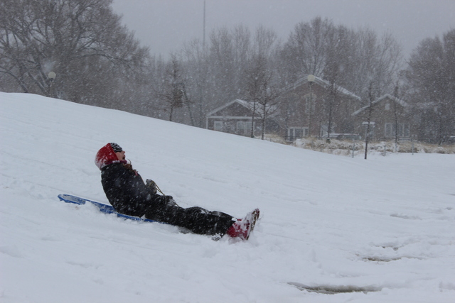 <p>A girl yells as she sleds down the hill at&nbsp;Palmisano&nbsp;Park &nbsp;in the city's Bridgeport neighborhood Tuesday afternoon.</p>
