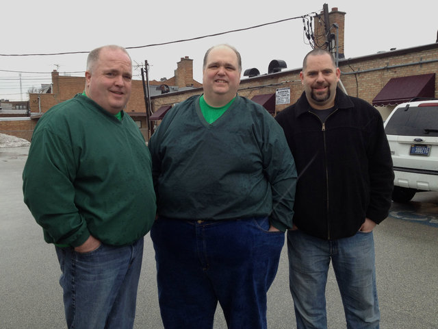 <p>Pat Winters, 43, his brother Bill "Uncle Wiggy" Winters, 48, and their family friend Joe Lecompte, 40, near their lot party on 107th Street.</p>
